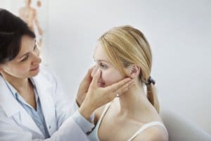 Lady being examined pre treatment