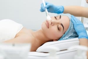 Lady having skin peel treatment