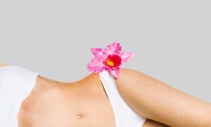 woman-lying-on-side-with-flower